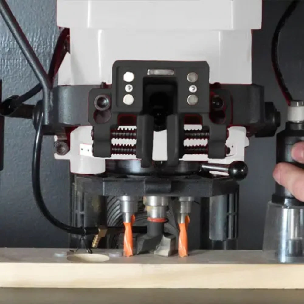 Multi-spindle drill head boring cabinet hinge cups in door panel