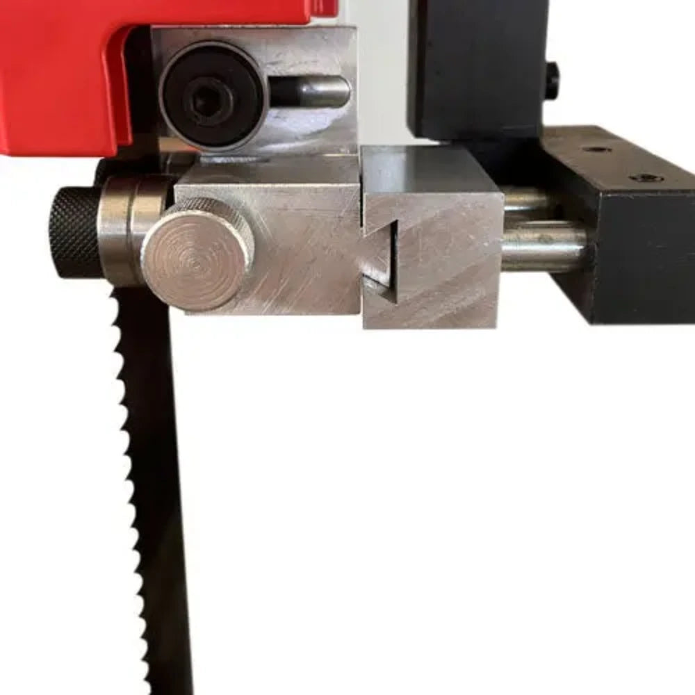 Close-up of band saw blade guide block and support shaft