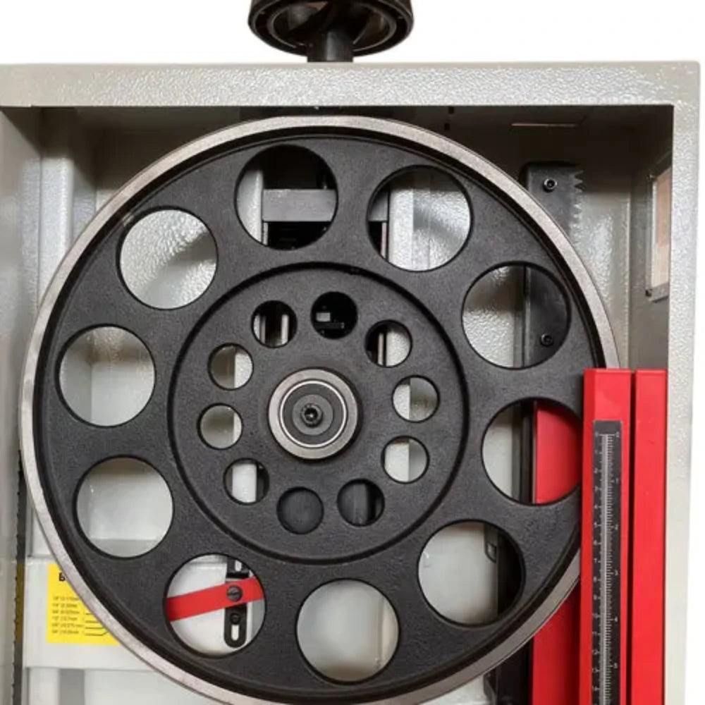 Large spoked wheel inside upper cabinet for smooth blade tracking