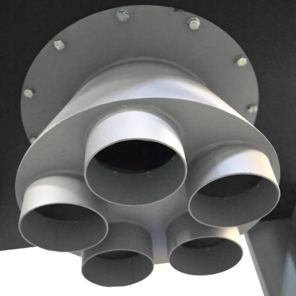 Close-up of heavy filter bags mounted under steel support table