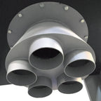 Close-up of heavy filter bags mounted under steel support table