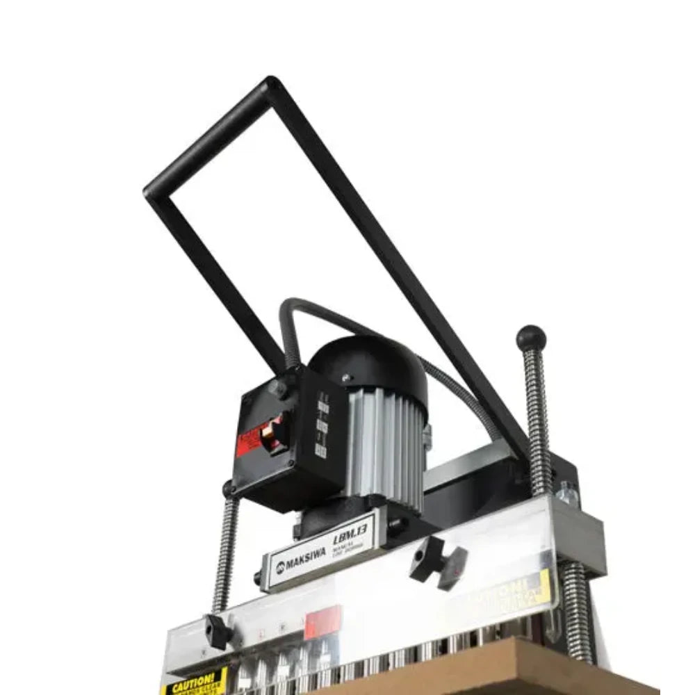 Angled view of motor head and 13-spindle boring row