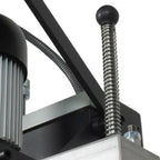 Spring-loaded hold-down foot keeps workpiece stable during drilling