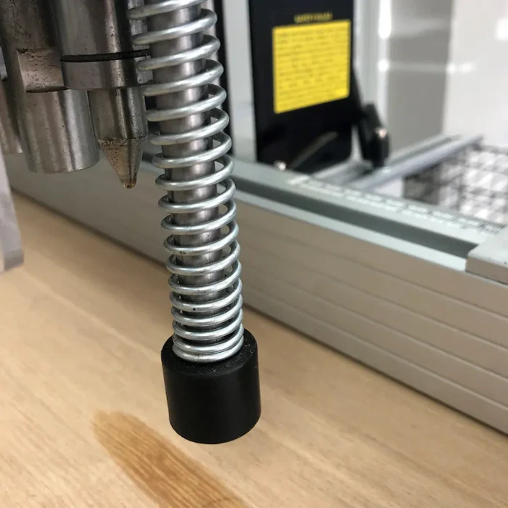 Yellow foot pedal activates pneumatic boring head for hands-free operation