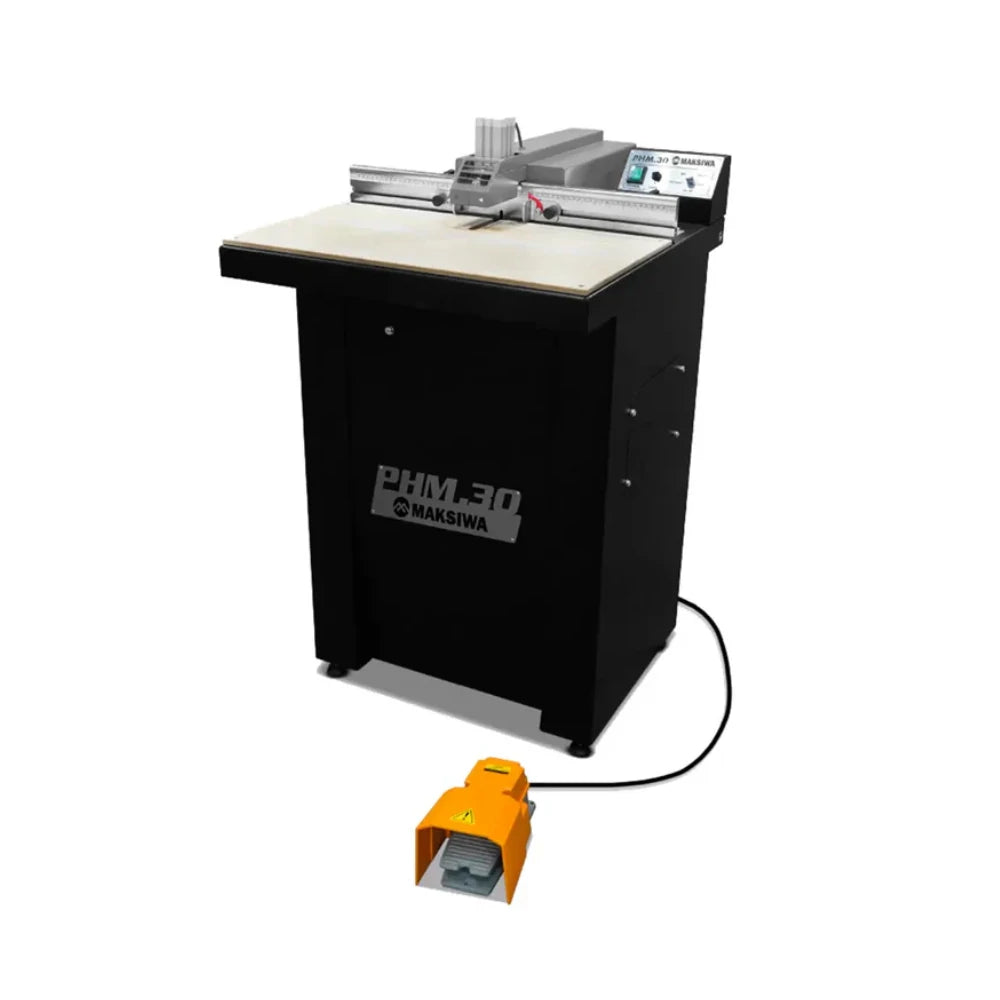 Operator drills angled pocket holes in melamine panel on PHM.30