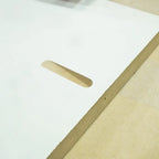 Close-up of clean pocket hole cut on MDF core panel
