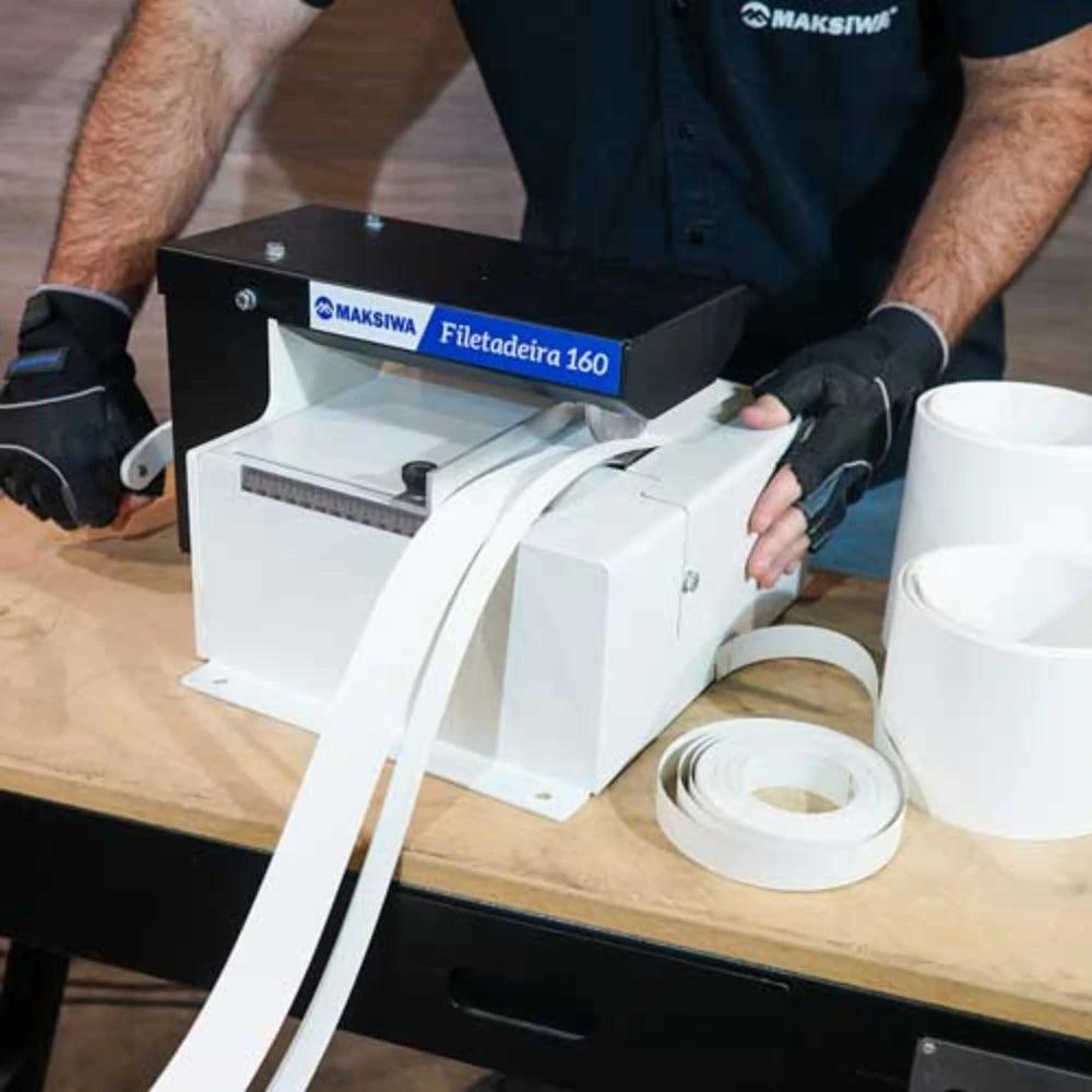 Side view showing crank handle and adjustable cutting guide