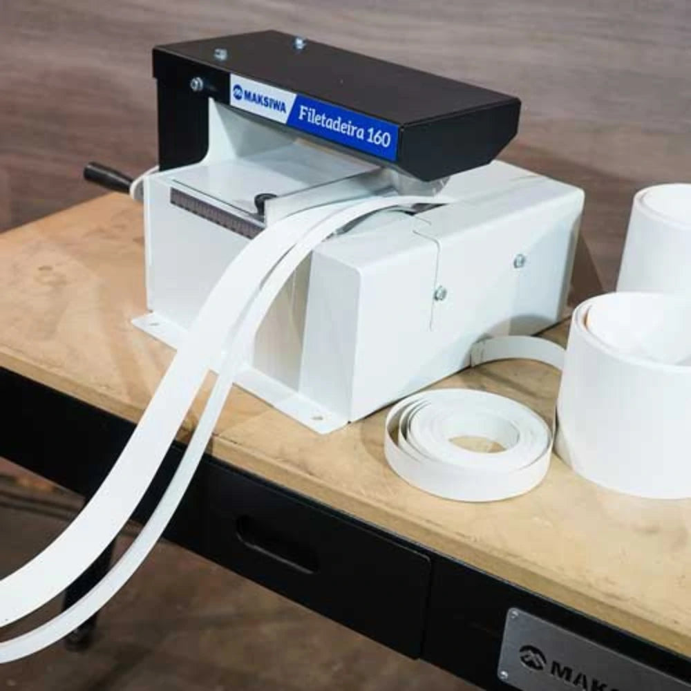Benchtop slitter with edge banding roll and measured feed opening