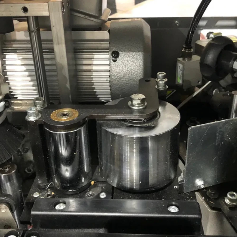 Maksiwa Titanium edge bander CBC.T with enclosed processing hood and operator control panel