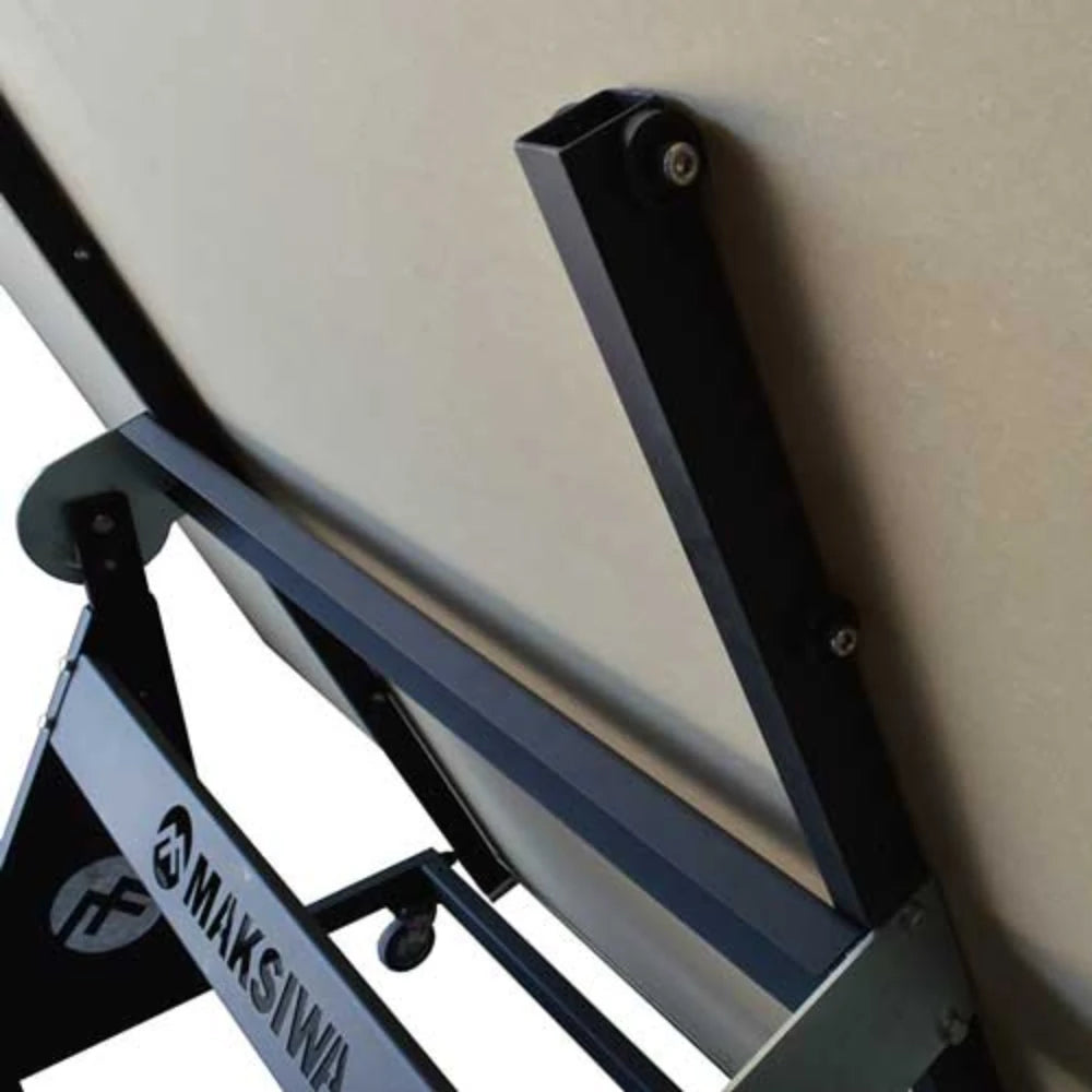 Close-up of angled support bracket holding large sheet goods securely