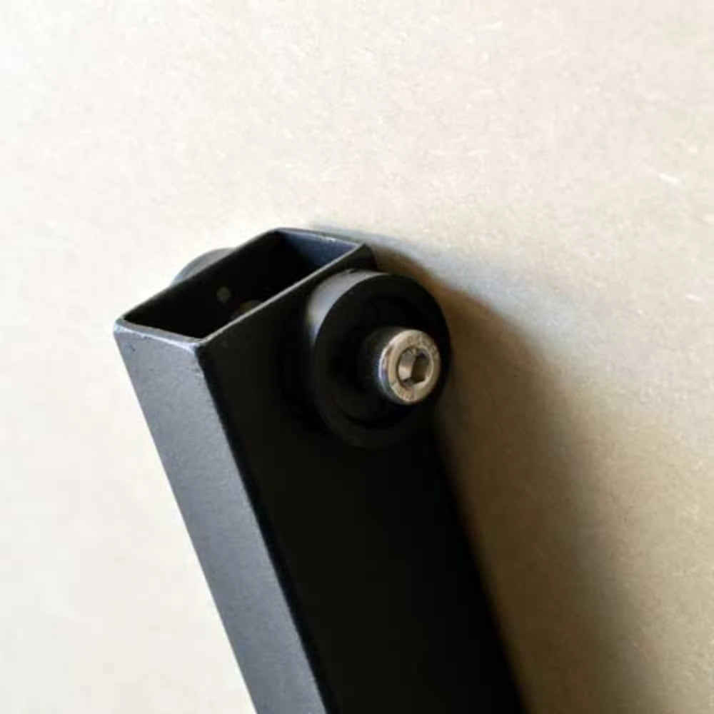 Detail of padded roller wheel on vertical panel support arm